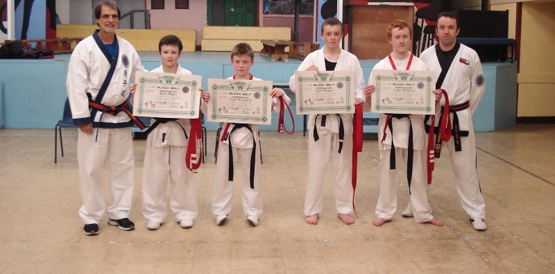 Some of our new black belts Rian Brady, Cian McCarthy, Jack Murphy and Luke Kennedy with Grand Master Giacobbe and Master Forde.