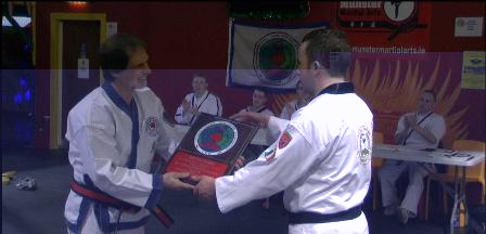 Master Forde receives award from Grand Master Giacobbe.